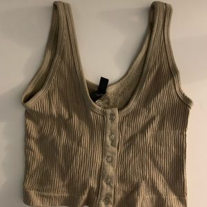 Urban Outfitters out from under cropped tank top